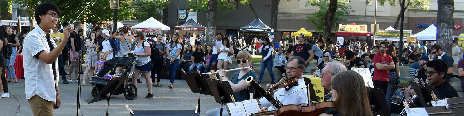 musicians playing to the community